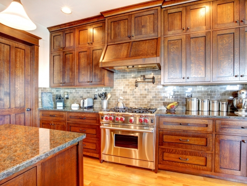 Luxury pine wood beautiful custom kitchen interior design with island and granite.