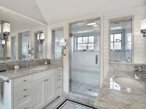 Master bath in luxury home with windowed shower